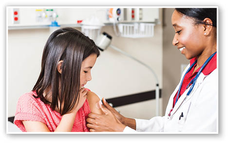 Doctor applying bandaid after giving a shot