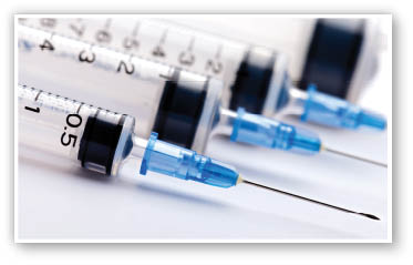 Syringe in the white background 